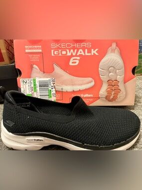 Skechers Black Slip-On Knit Walking Shoe with White Sole